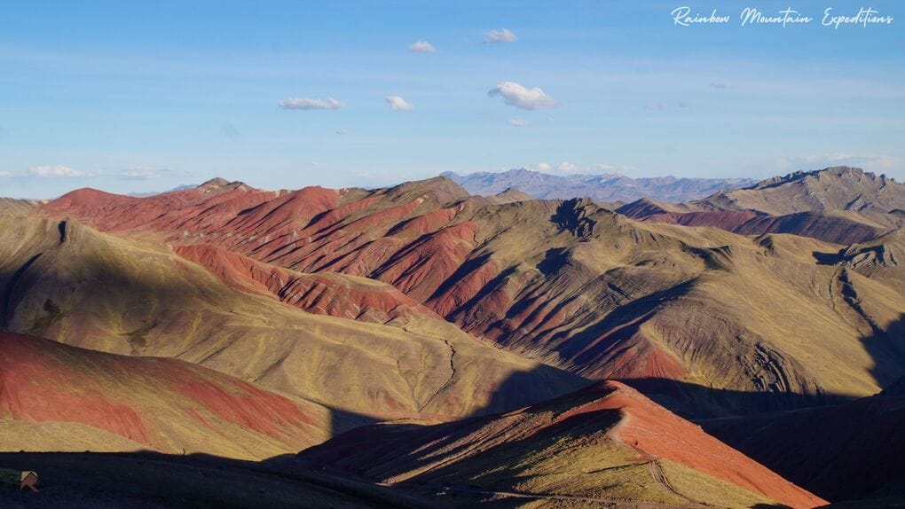 The Red Valley is situated behind the Rainbow Mountain, The Red Valley is situated behind the Rainbow Mountain.