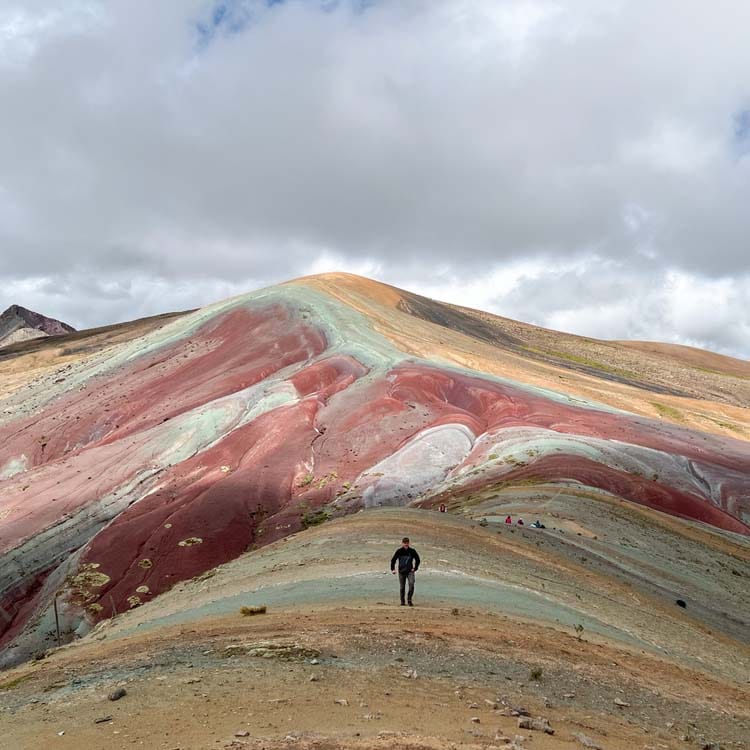 A colorful mountain ready to be scaled during a Condor Canyon tour in Cusco