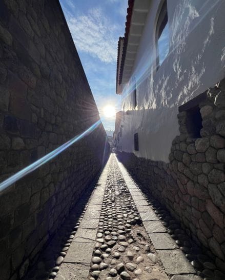 Morning sun illuminating Santa Monica Street in Cusco