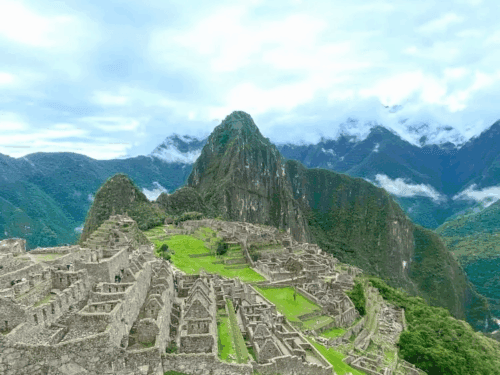 aerial shot of Machu Picchu against a blue sky