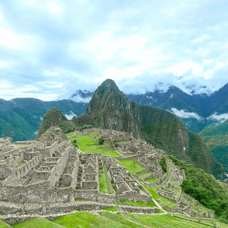 machu picchu  aerial shot of Machu Picchu against a blue sky