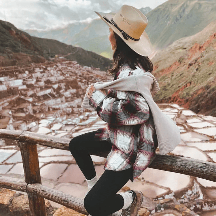  a woman gazing towards the sacred valley 