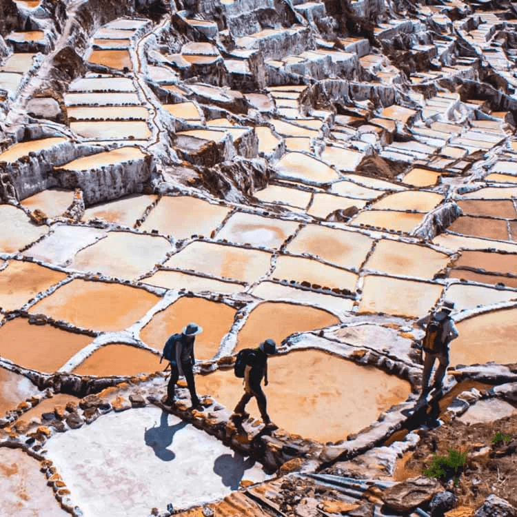 People walking on a ground with marble sections