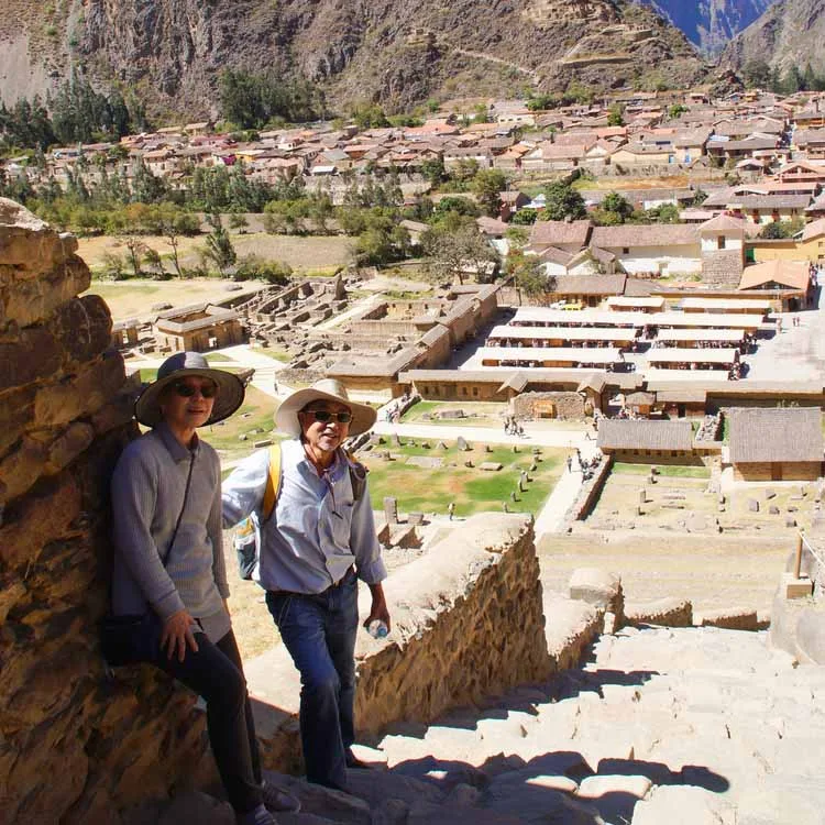 2 men posing in front of the Sacred Valley