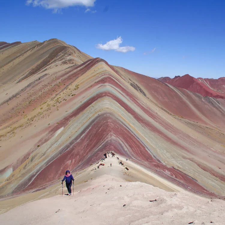 people trekking the Rainbow Mountain