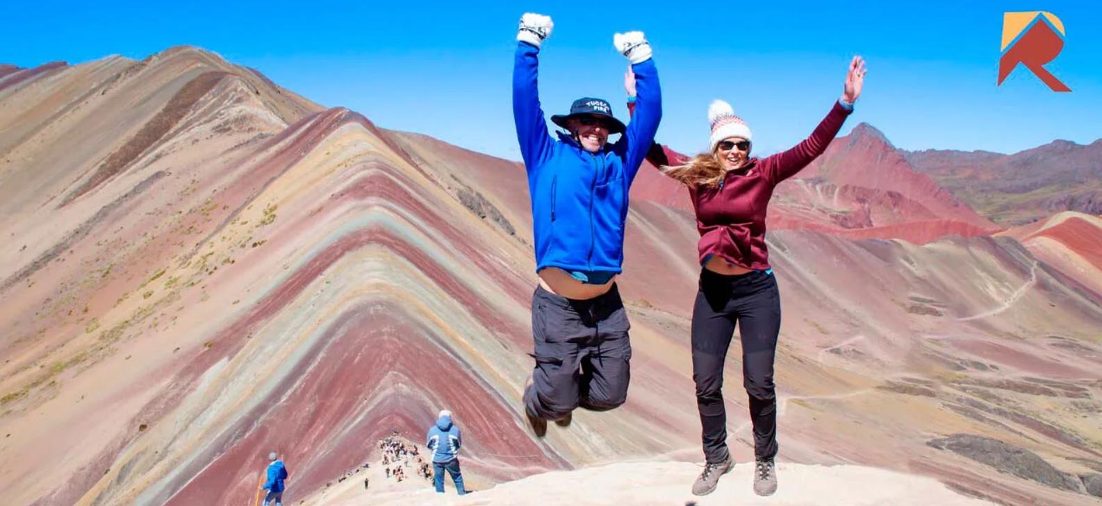 Two people standing and jumping in one place