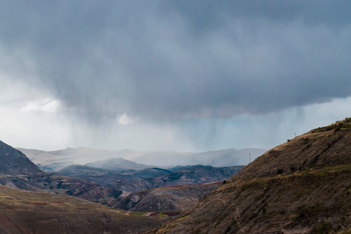 Dark storm clouds rolling over the Andean highlands near Cusco, Peru.