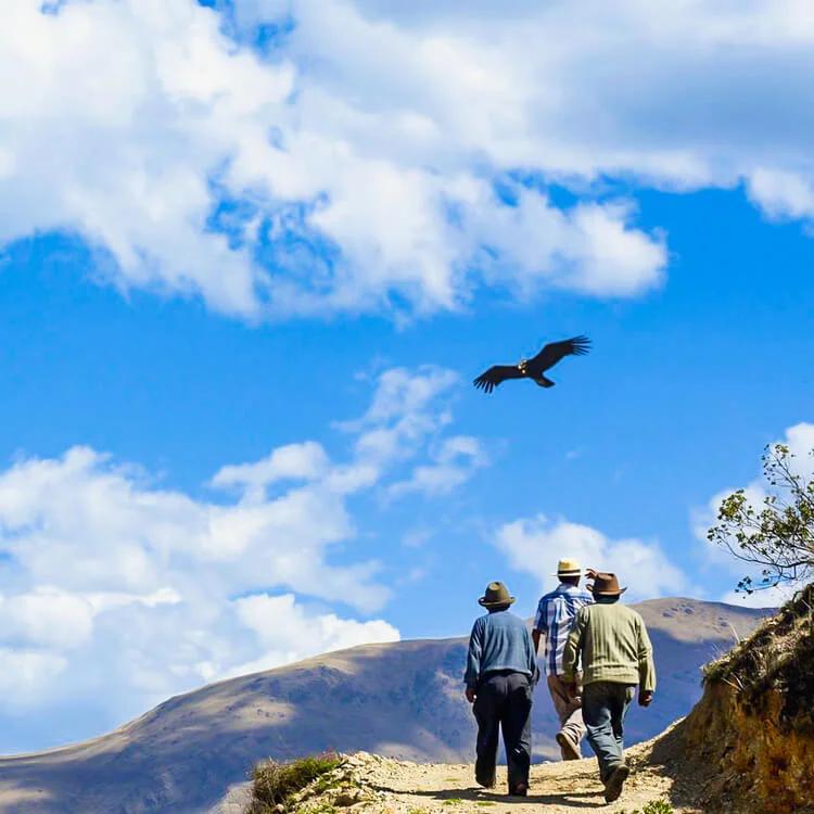 Hiker taking on the high-altitude Rainbow Mountain trail