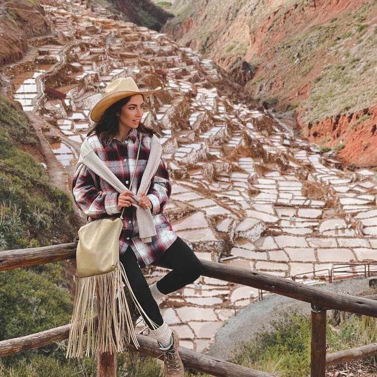 Woman standing in the Sacred Valley near Cusco, Peru